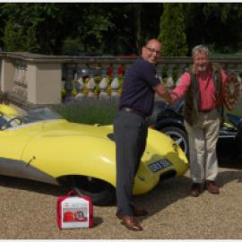 Paul Caller presenting the Autoglym Shield to Edward Stephens for the restoration of his 1958 Lotus Eleven Le Mans